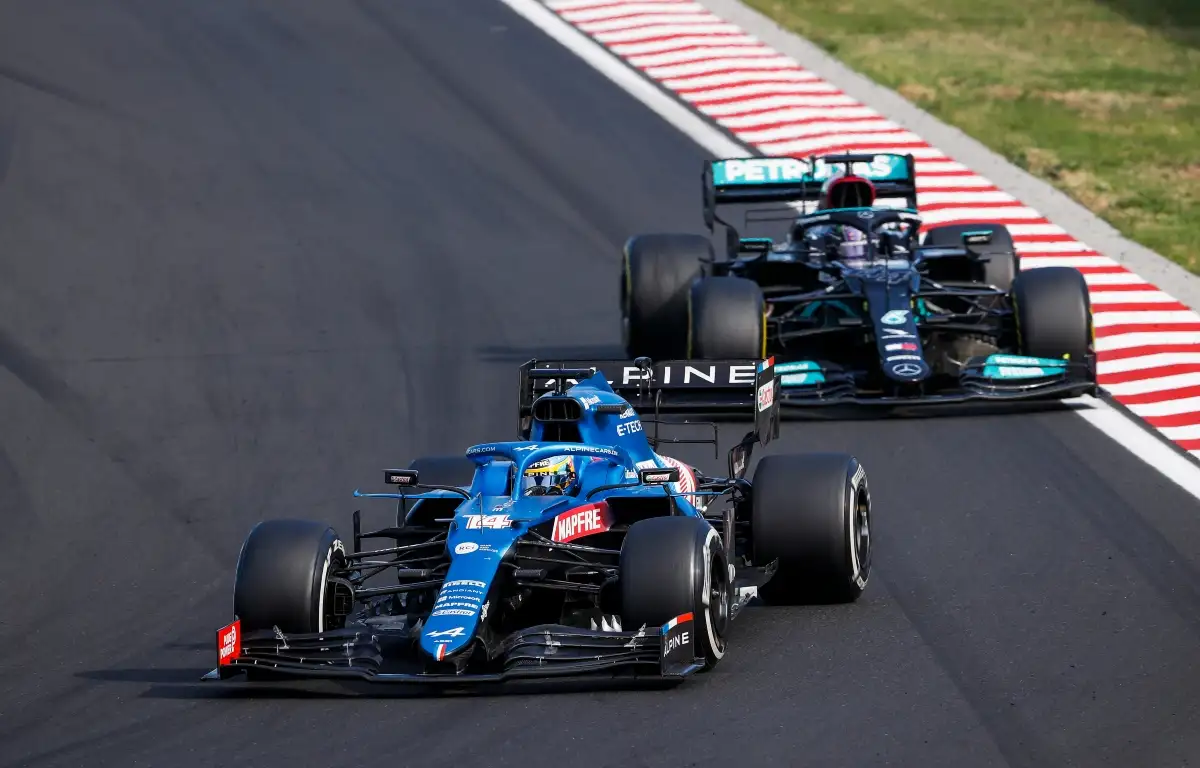 Fernando Alonso holding off Lewis Hamilton. Hungary August 2021