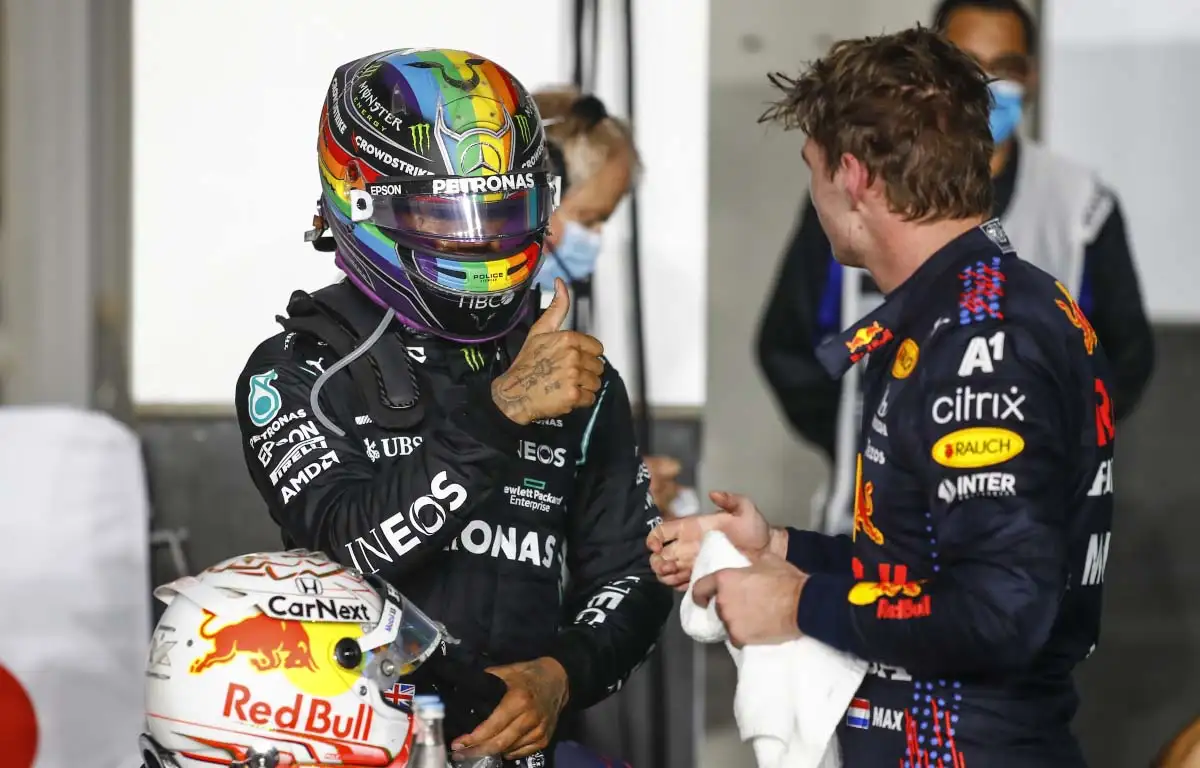 Lewis Hamilton gives Max Verstappen a thumbs-up. Qatar November 2021.