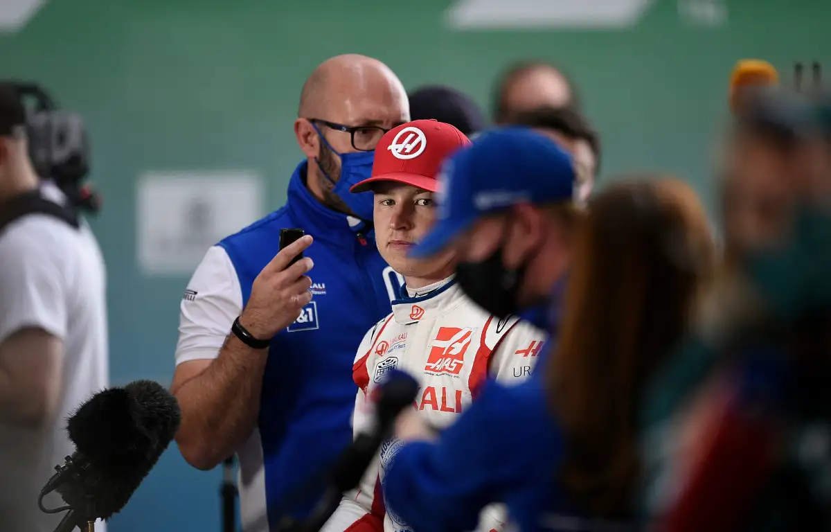 Nikita Mazepin looks over at Mick Schumacher. Qatar November 2021