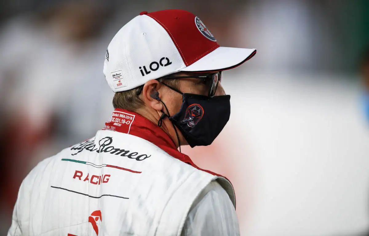 Kimi Raikkonen in the paddock wearing a mask. Qatar November 2021.