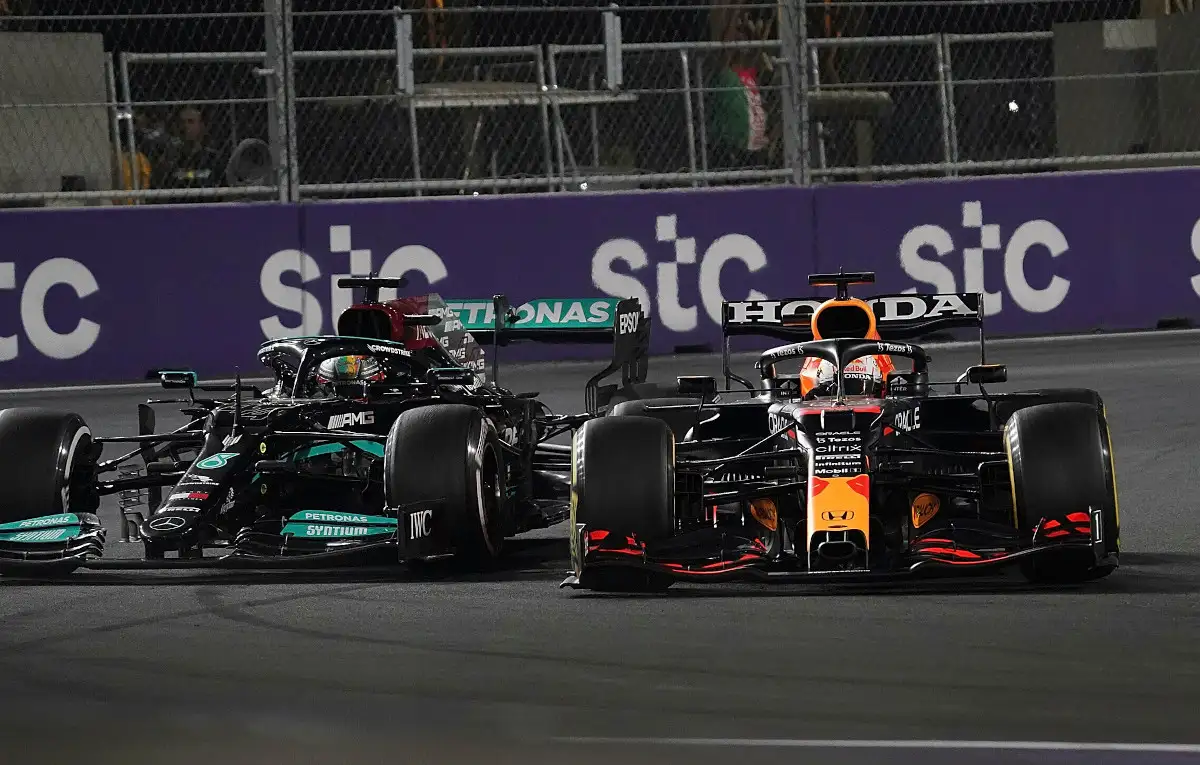 Lewis Hamilton and Max Verstappen fighting. Formula 1 Saudi Arabia December 2021