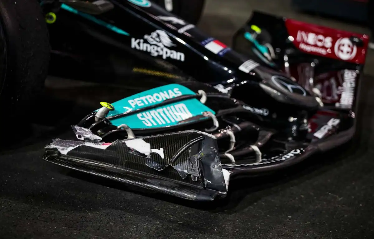 Lewis Hamilton has frotn wing damage. Saudi Arabia December 2021.