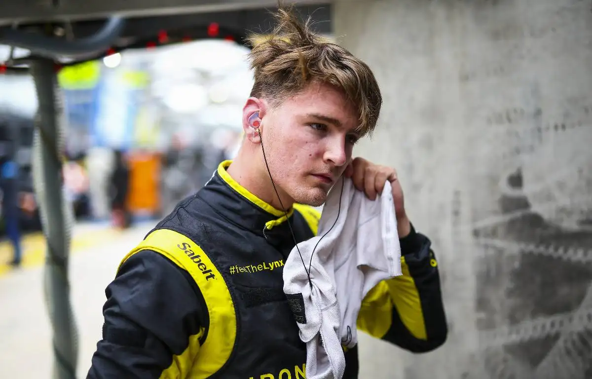 Logan Sargeant removes his earpiece. Le Mans August 2021.