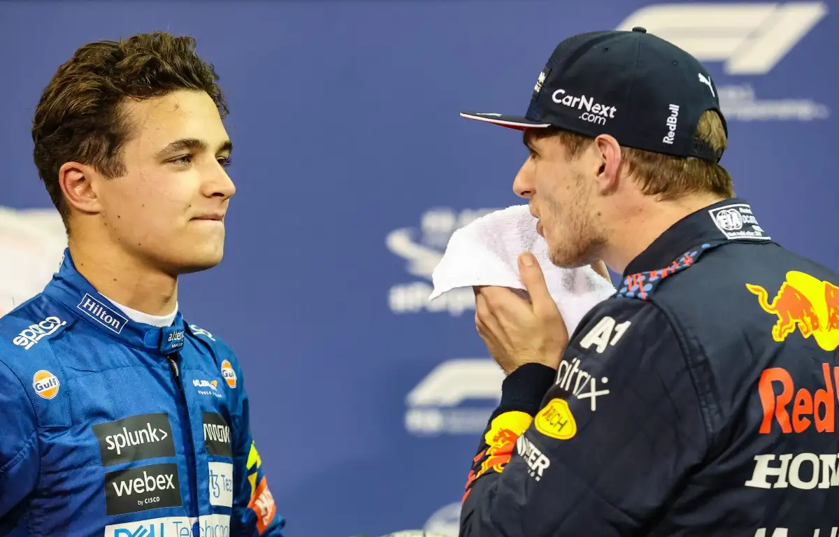 Lando Norris and Max Verstappen talk after qualifying. Abu Dhabi, December 2021.