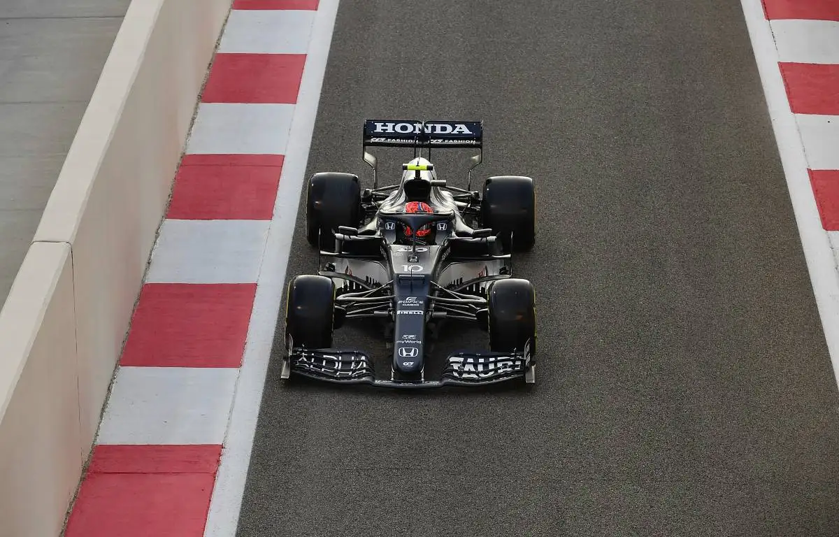 Pierre Gasly, AlphaTauri, exits the pits. Abu Dhabi, December 2021.