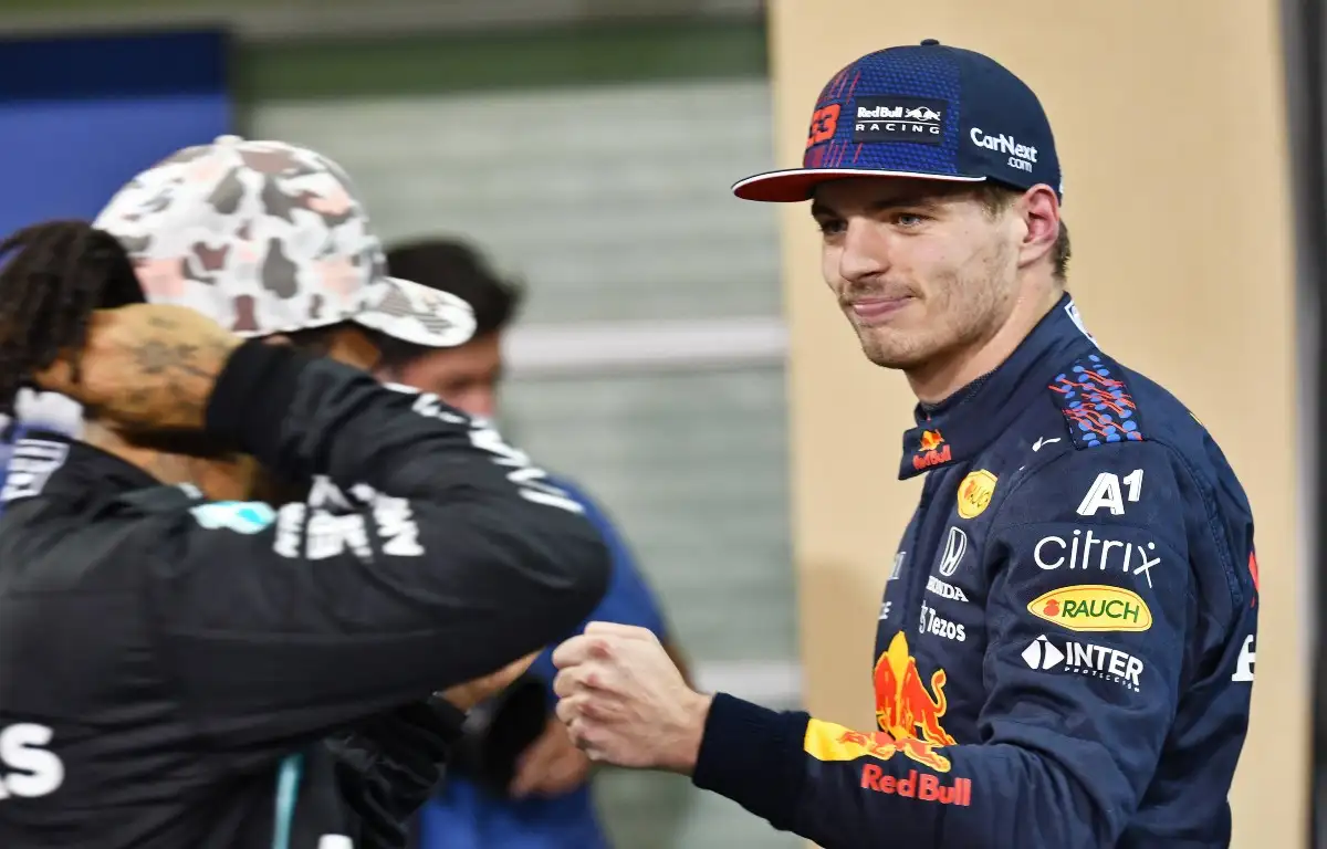 Max Verstappen offers fist bump to Lewis Hamilton. FIA Formula 1 Abu Dhabi, December 2021.