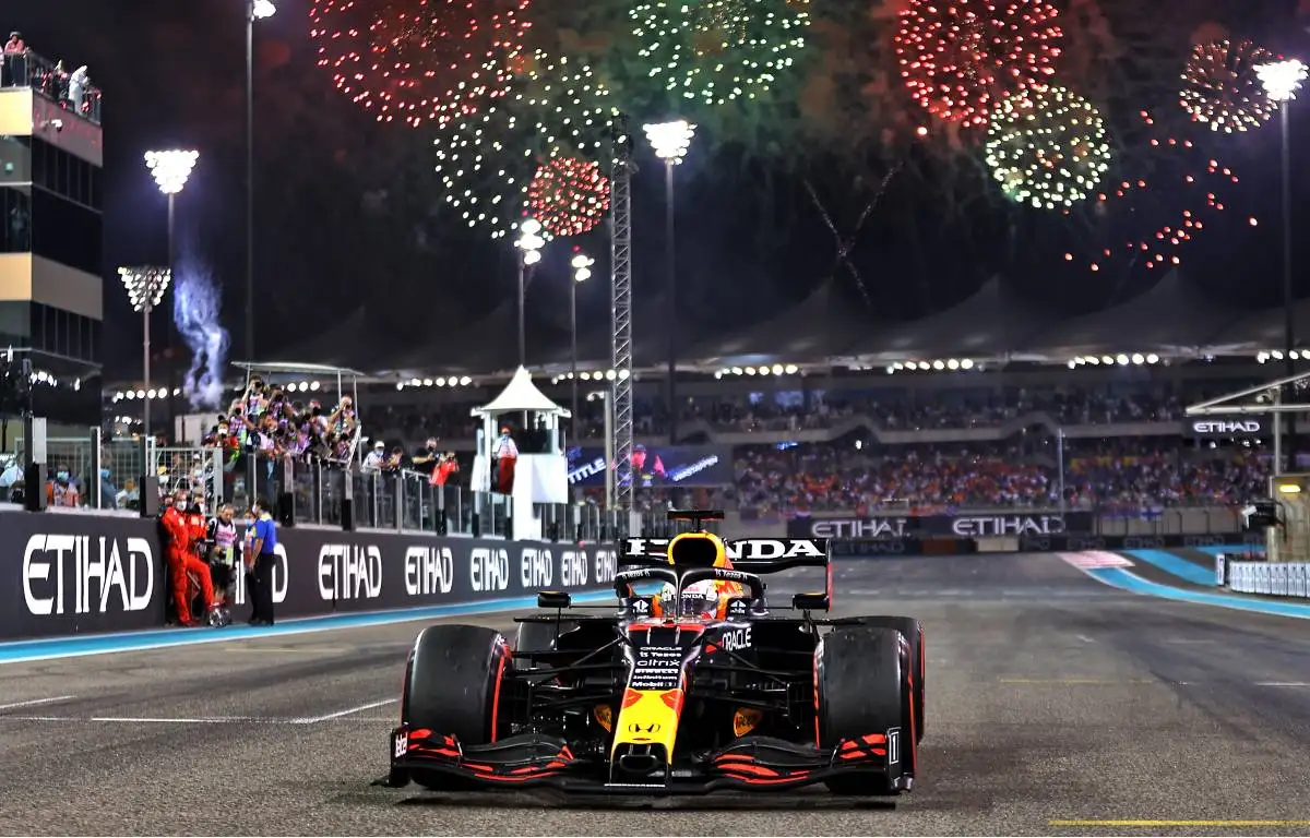 Max Verstappen's Red Bull in front of fireworks after winning the Abu Dhabi GP. Yas Marina December 2021.
