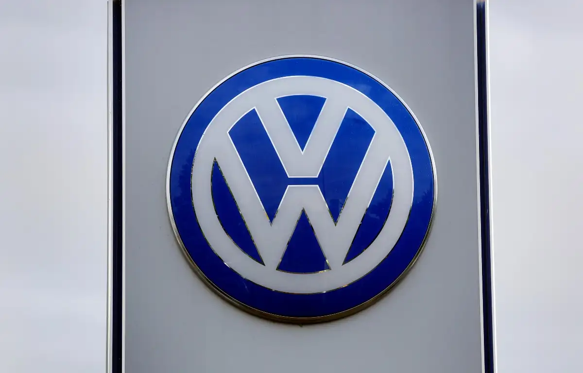 Volkswagen logo at a dealership. England, September 2015.