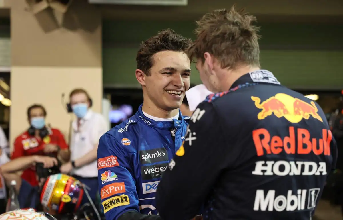 Lando Norris embraces Max Verstappen. Yas Marina December 2021.