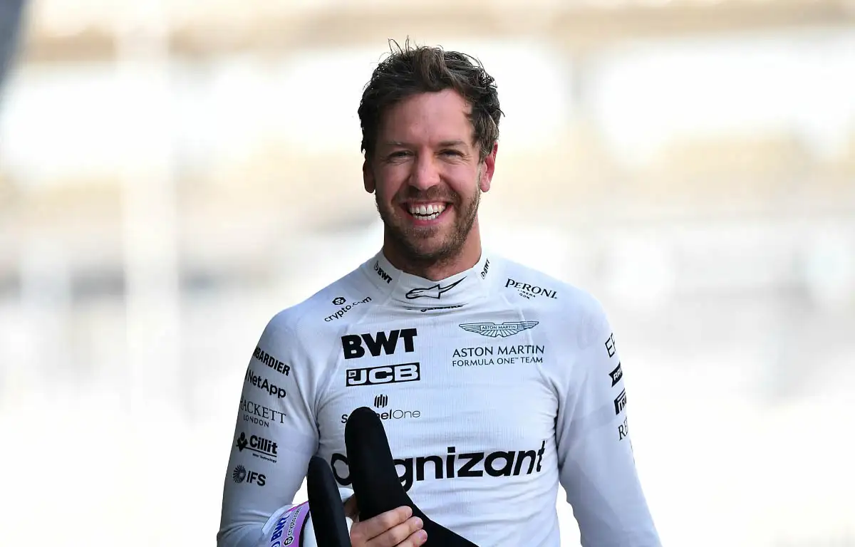 Sebastian Vettel smiling in the pit lane. Abu Dhabi December 2021.