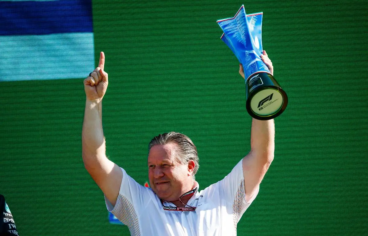 McLaren CEO Zak Brown celebrating on the Italian GP podium. Monza September 2021.