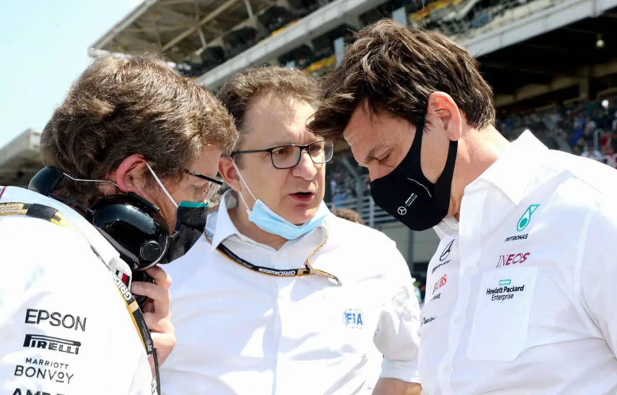 Toto Wolff talks to FIA technical chief Nikolas Tombazis. Interlagos November 2021.