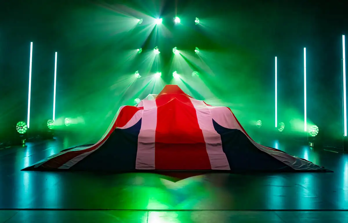 The 2021 Aston Martin covered with a Union Jack. Silverstone February 2021.