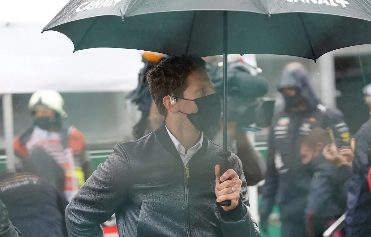 Romain Grosjean under an umbrella. Belgium, August 2021.