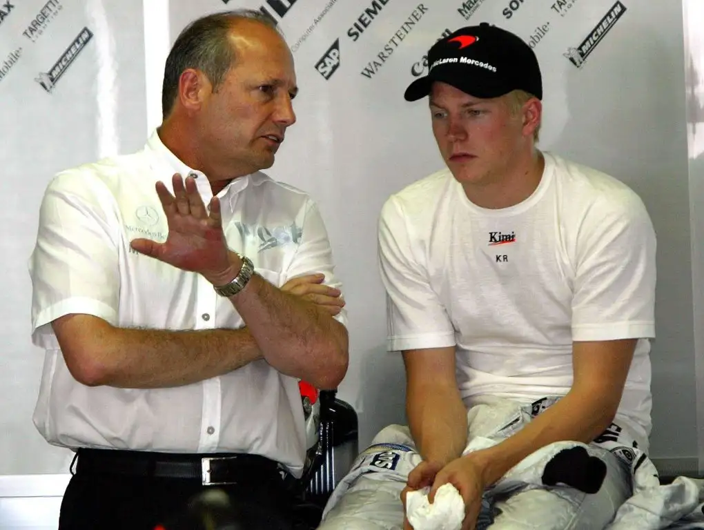 Ron Dennis and Kimi Raikkonen talk. Germany, August 2003.
