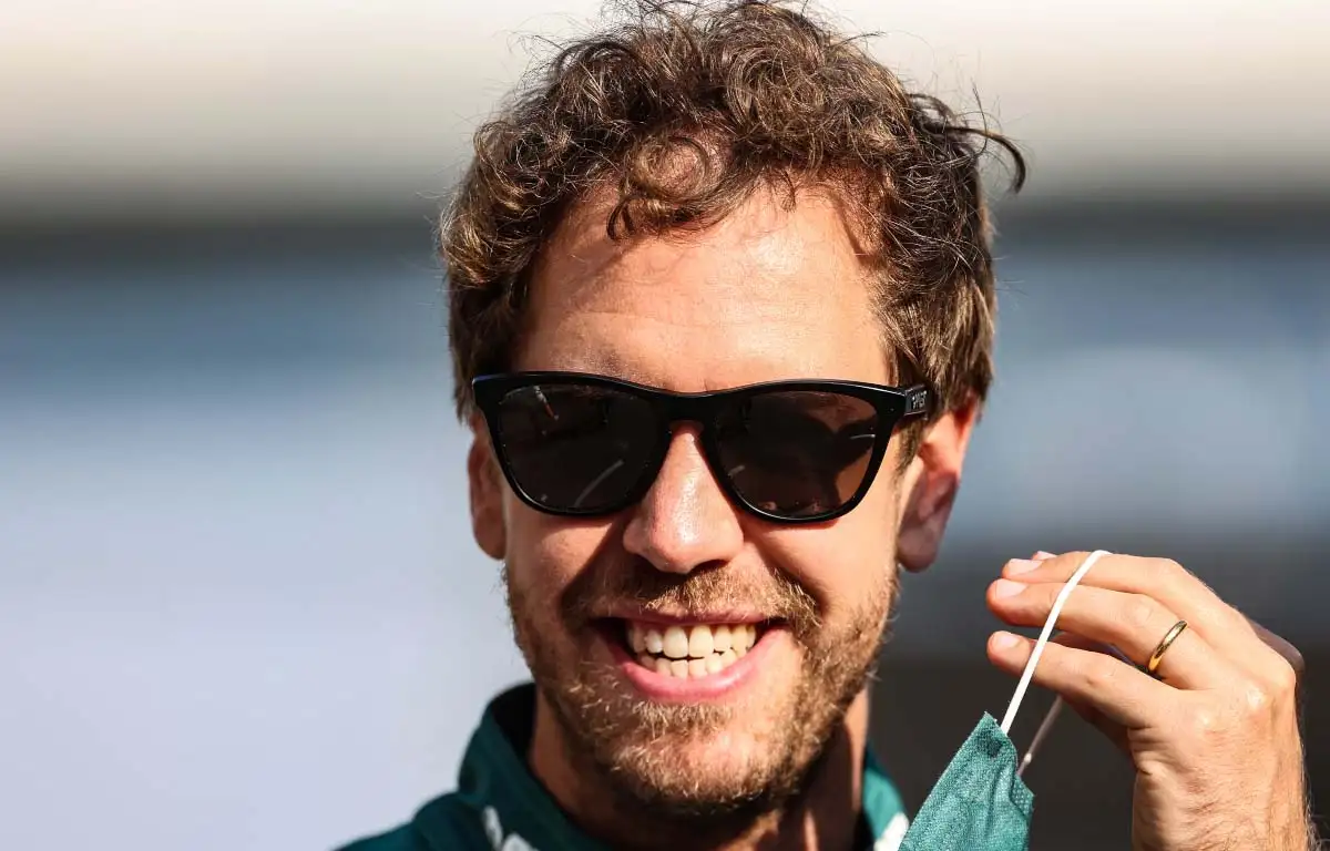 Sebastian Vettel takes off his mask. Abu Dhabi December 2021.