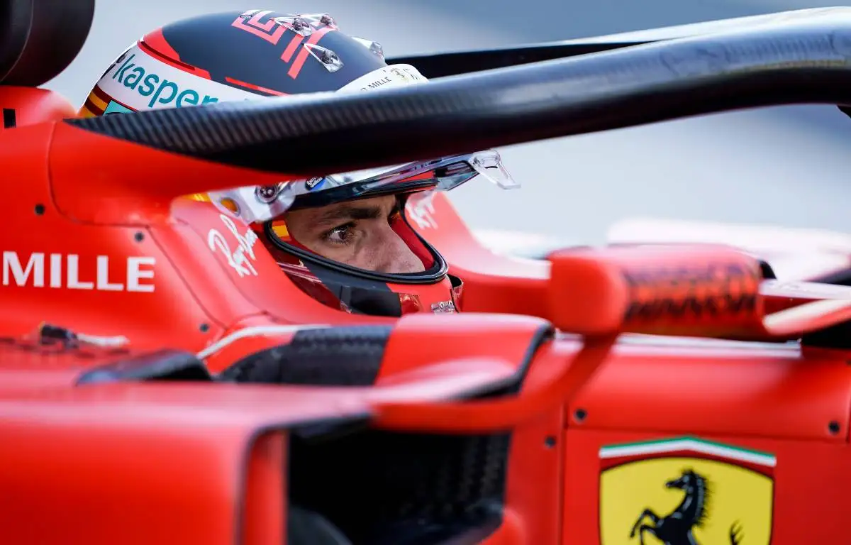 Carlos Sainz in the Ferrari cockpit. Abu Dhabi December 2021.