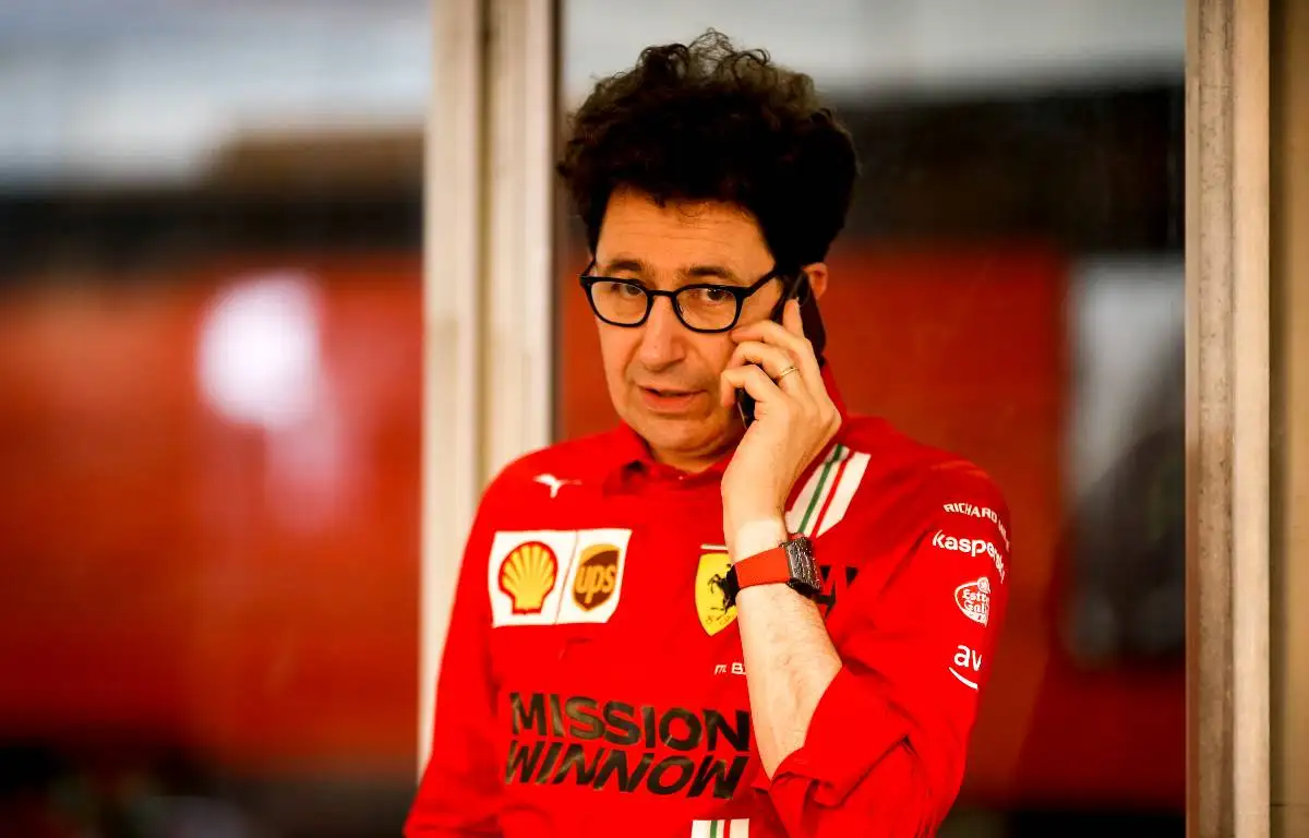 Mattia Binotto mid-telephone call at the Qatar GP. Lusail November 2021.