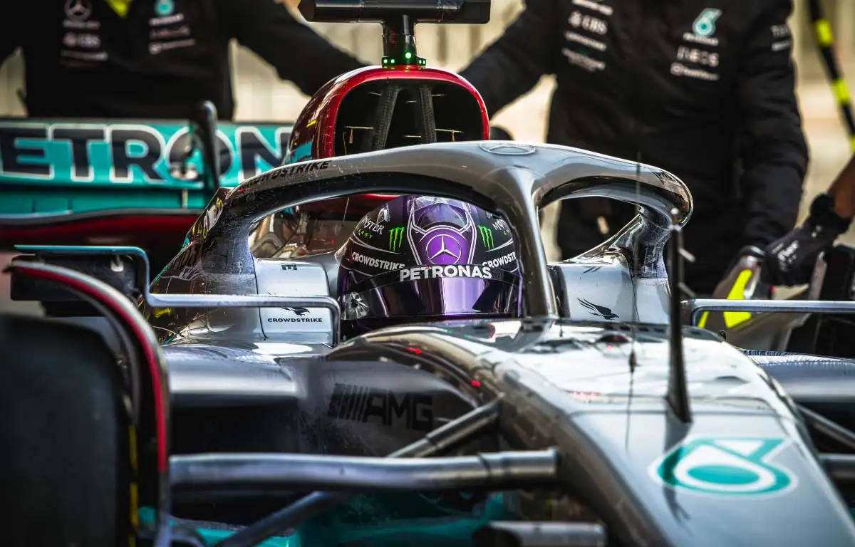 Lewis Hamilton sat in the Mercedes W13. Barcelona February 2022.