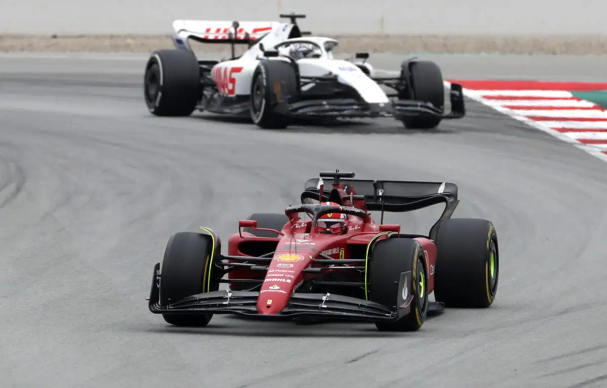 Charles Leclerc followed by Nikita Mazepin. Spain, February 2022.