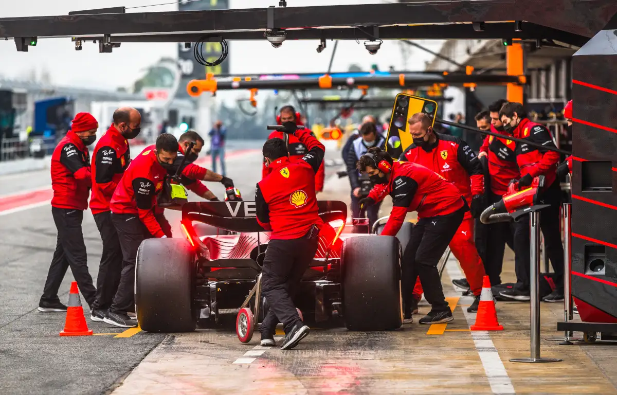 Charles Leclerc practices a pit stop with Ferrari in testing. Barcelona February 2022