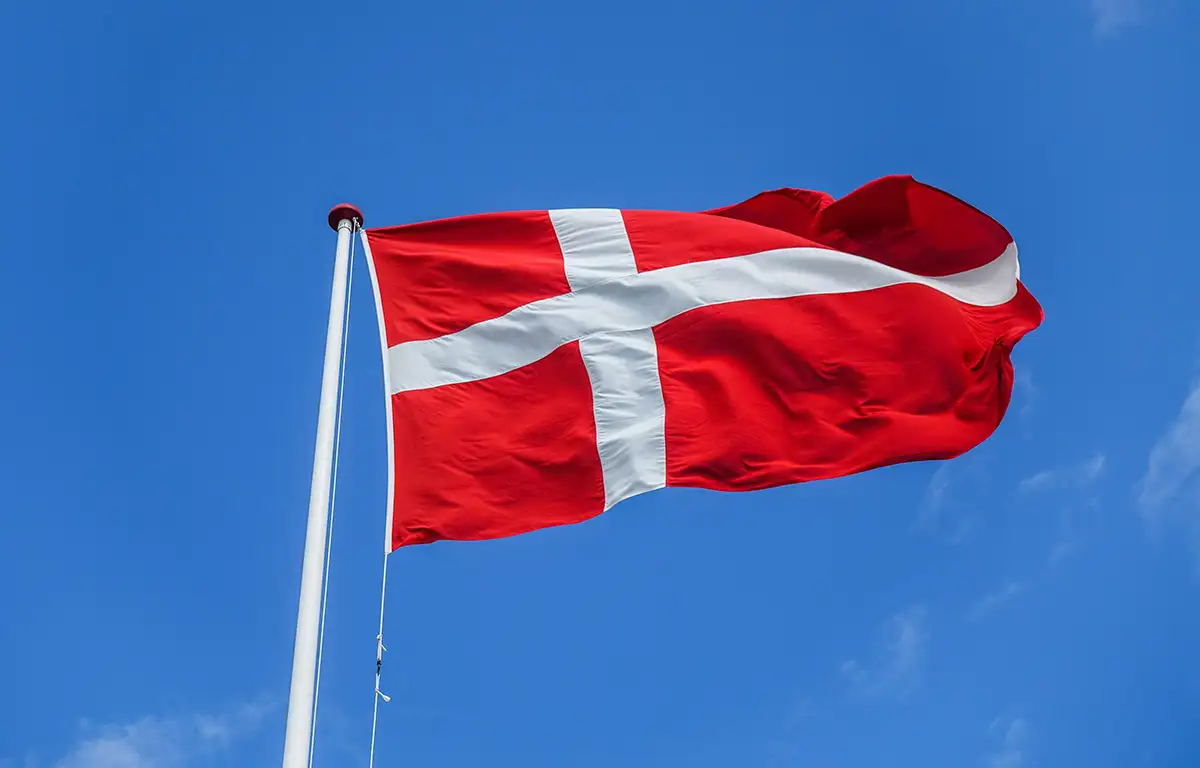 Denmark flag flutters in the wind. March 2022