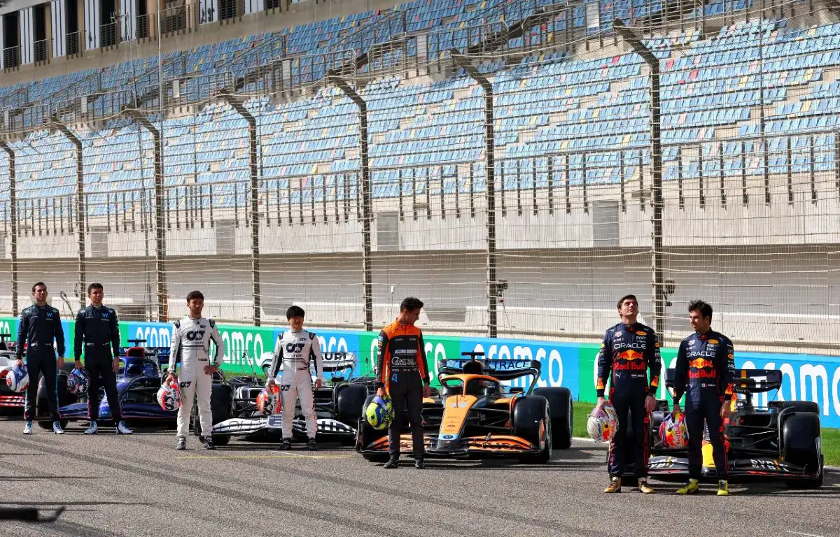 Drivers line up next to their car before pre-season testing. Bahrain March 2022.