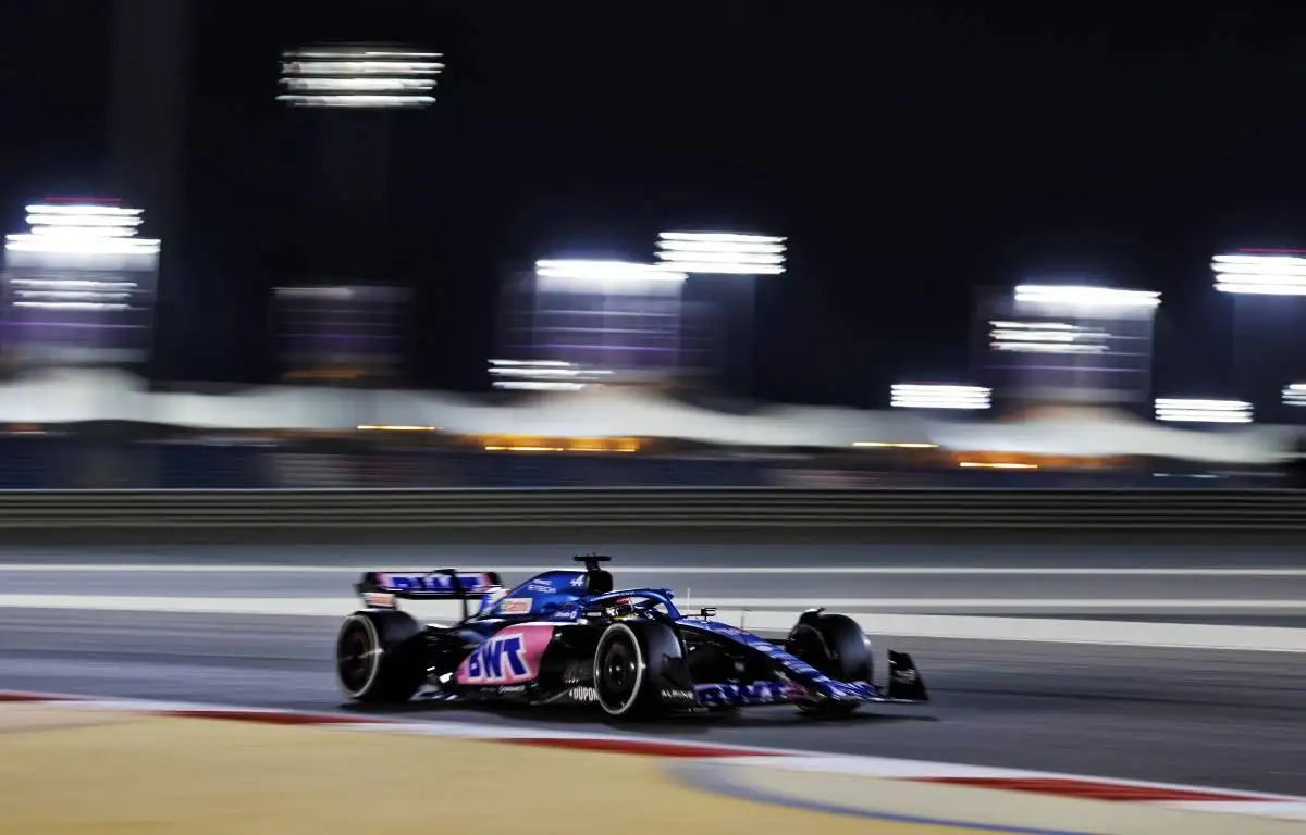 Fernando Alonso's Alpine under the lights during testing. Bahrain March 2022.