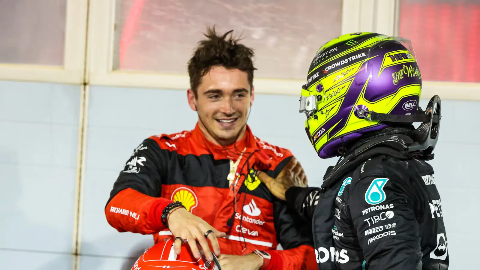 Lewis Hamilton congratulates Charles Leclerc. Bahrain March 2022