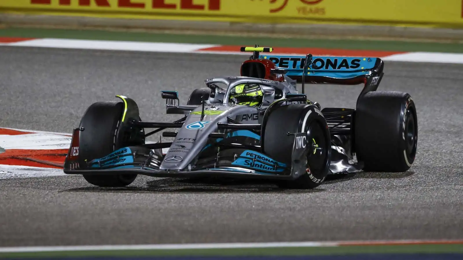 Mercedes driver Lewis Hamilton rounds Turn 1. Bahrain March 2022.