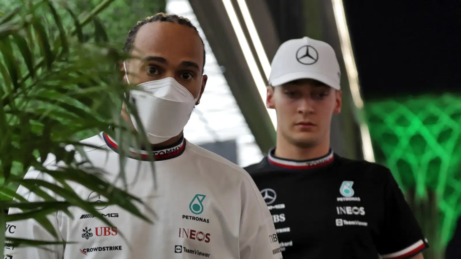 Mercedes' Lewis Hamilton and George Russell walk together. Saudi Arabia March 2022.