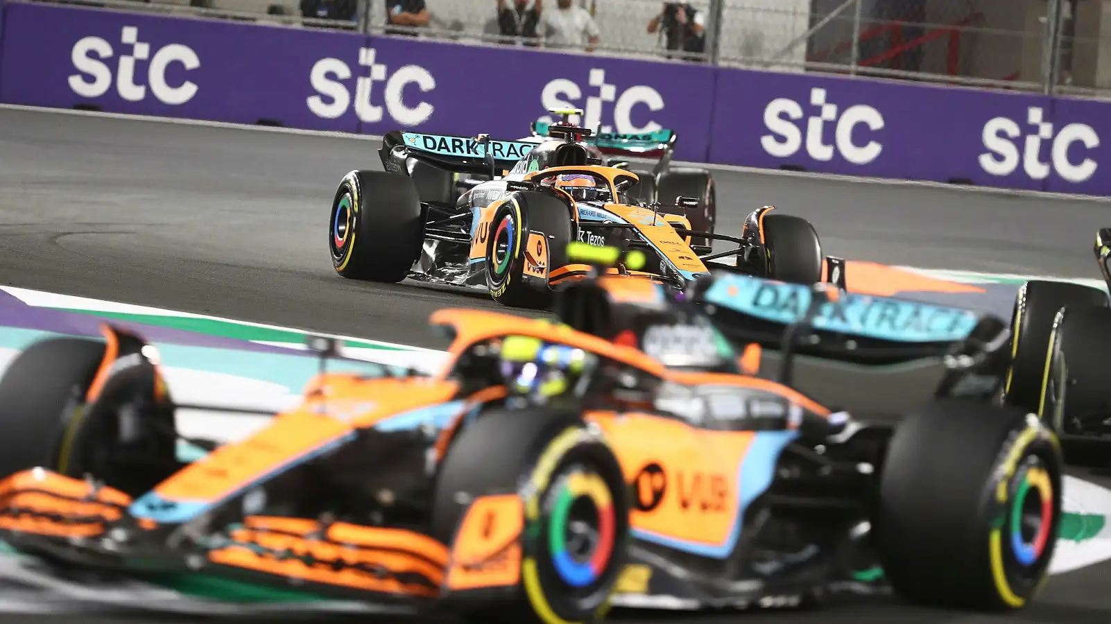 Daniel Ricciardo in focus with Lando Norris foreground. Saudi Arabia March 2022