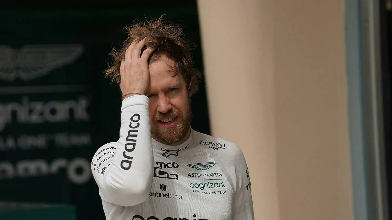 Sebastian Vettel with his hand in his hair. Bahrain March 2022.