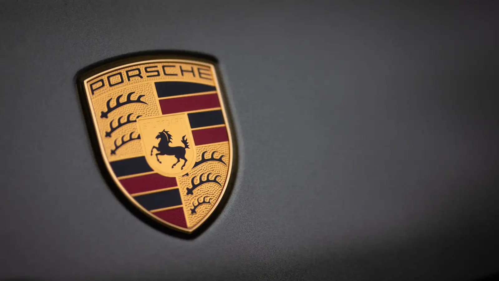 The Porsche logo is seen on a car at the company's headquarters. Germany February 2022