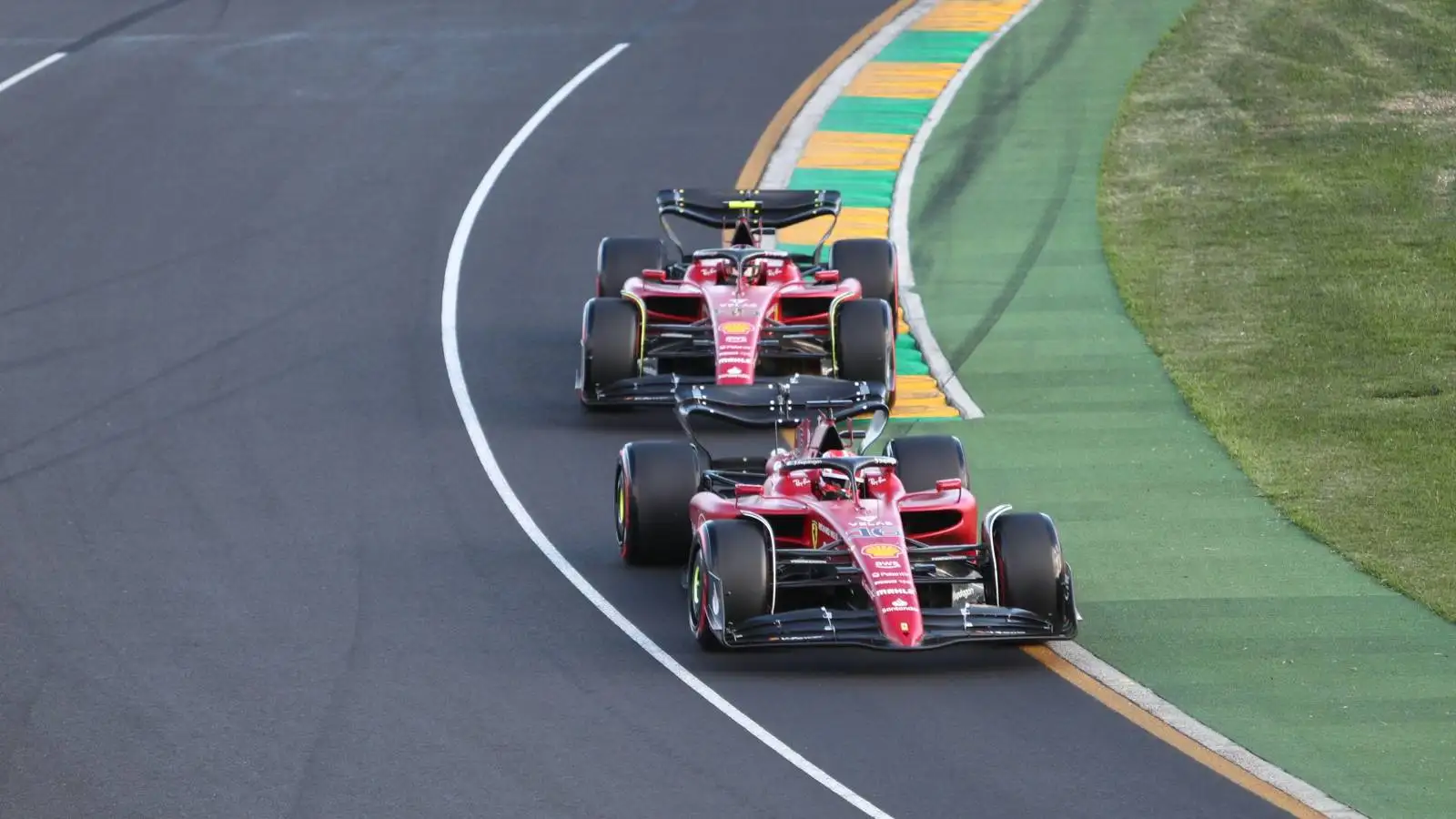Charles Leclerc, Carlos Sainz, Ferrari, together on track. Australia, April 2022.