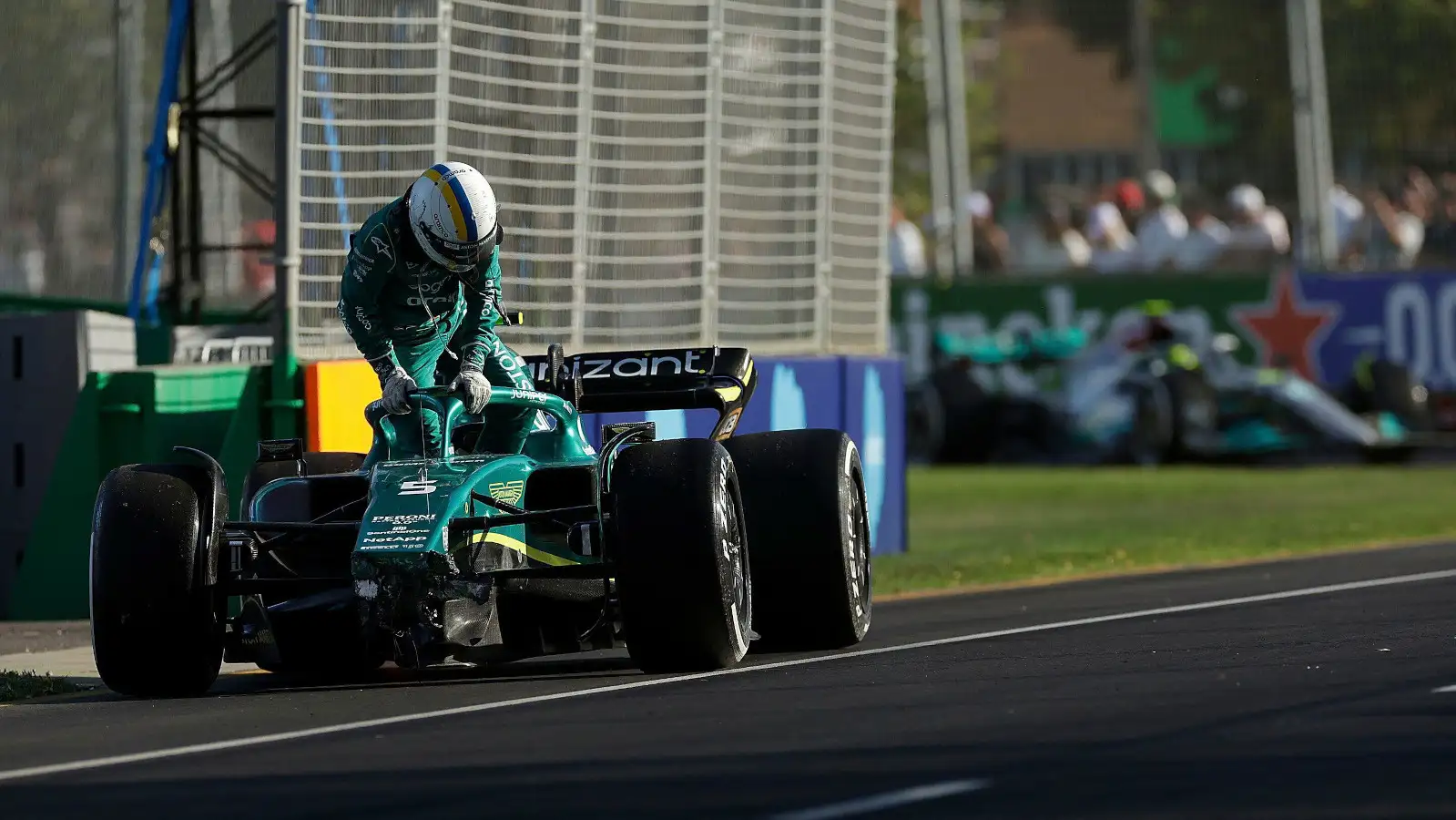 Sebastian Vettel climbs out of his broken down Aston Martin. Australia April 2022