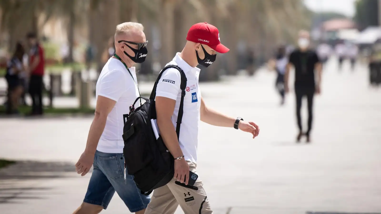 Dmitry Mazepin and Nikita Mazepin in the paddock. Bahrain, March 2021.