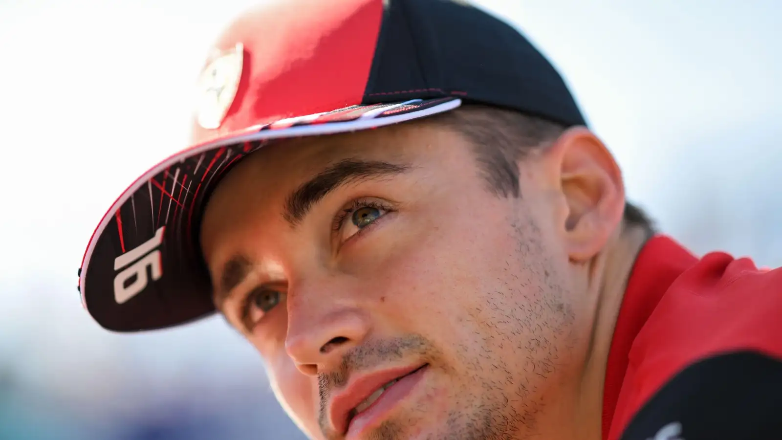 Charles Leclerc, Ferrari, looks up. Australia, April 2022.