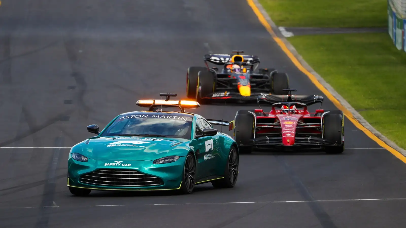 Aston Martin safety car ahead of Charles Leclerc and Max Verstappen. Australia, April 2022.