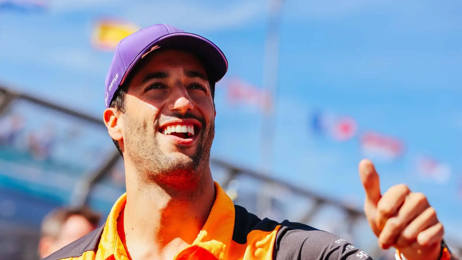 Daniel Ricciardo smiles at the crowd. Melbourne April 2022.