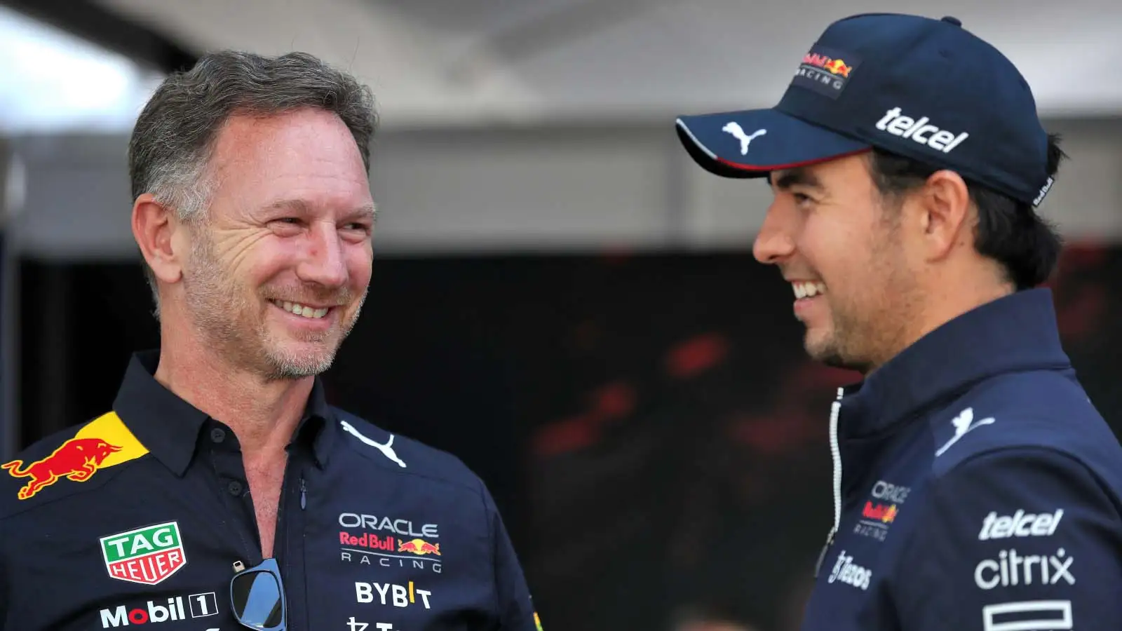 Christian Horner smiles with Sergio Perez. Australia April 2022.