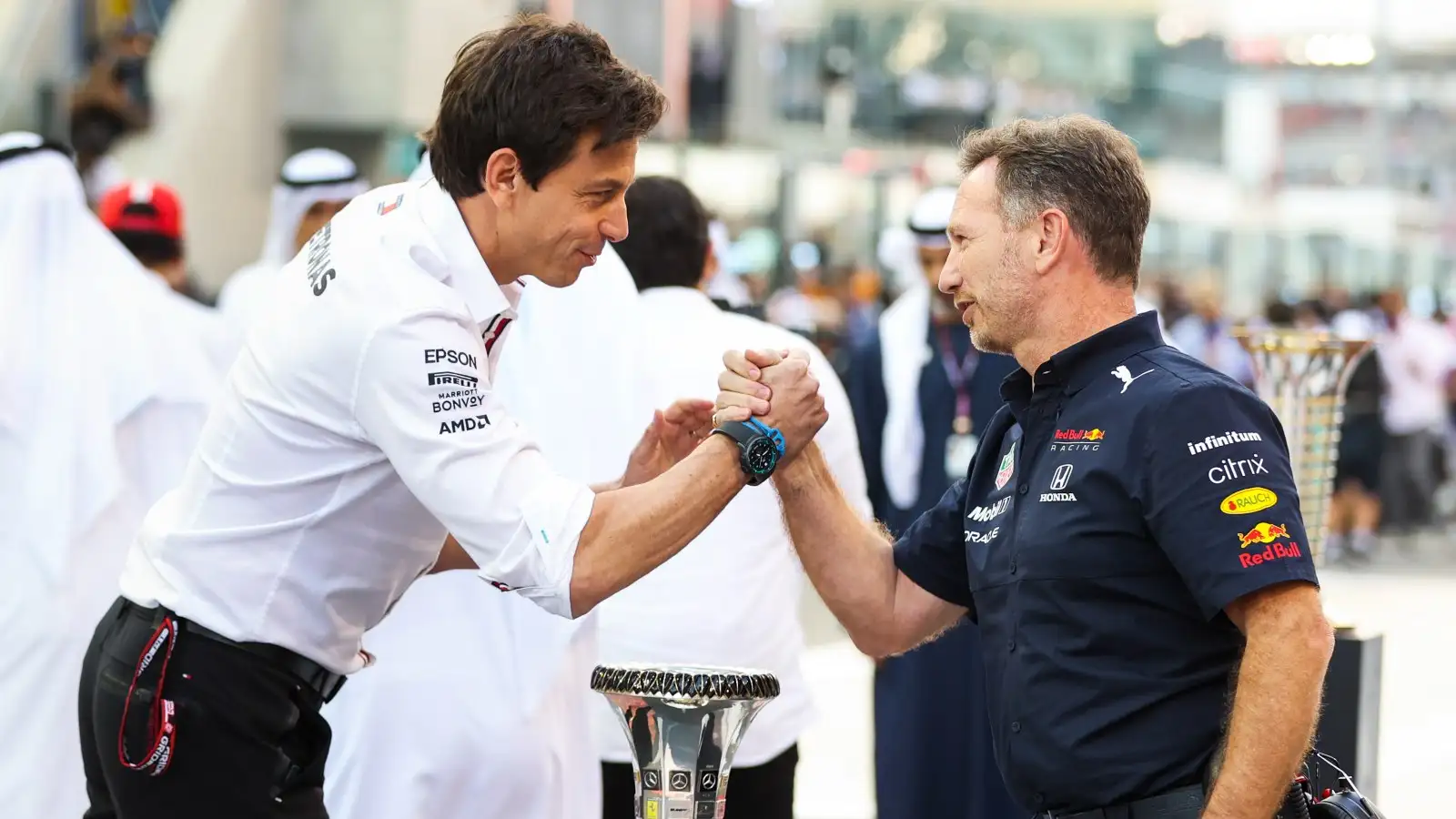 F1 team principals Toto Wolff and Christian Horner shake hands. Abu Dhabi, December 2021.