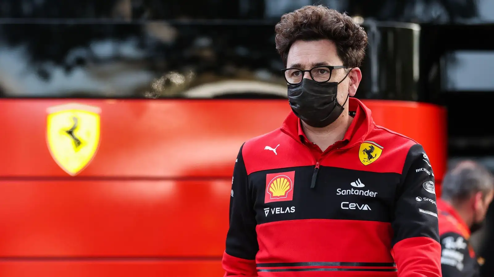 Ferrari principal Mattia Binotto walks through the paddock. Australia, April 2022.