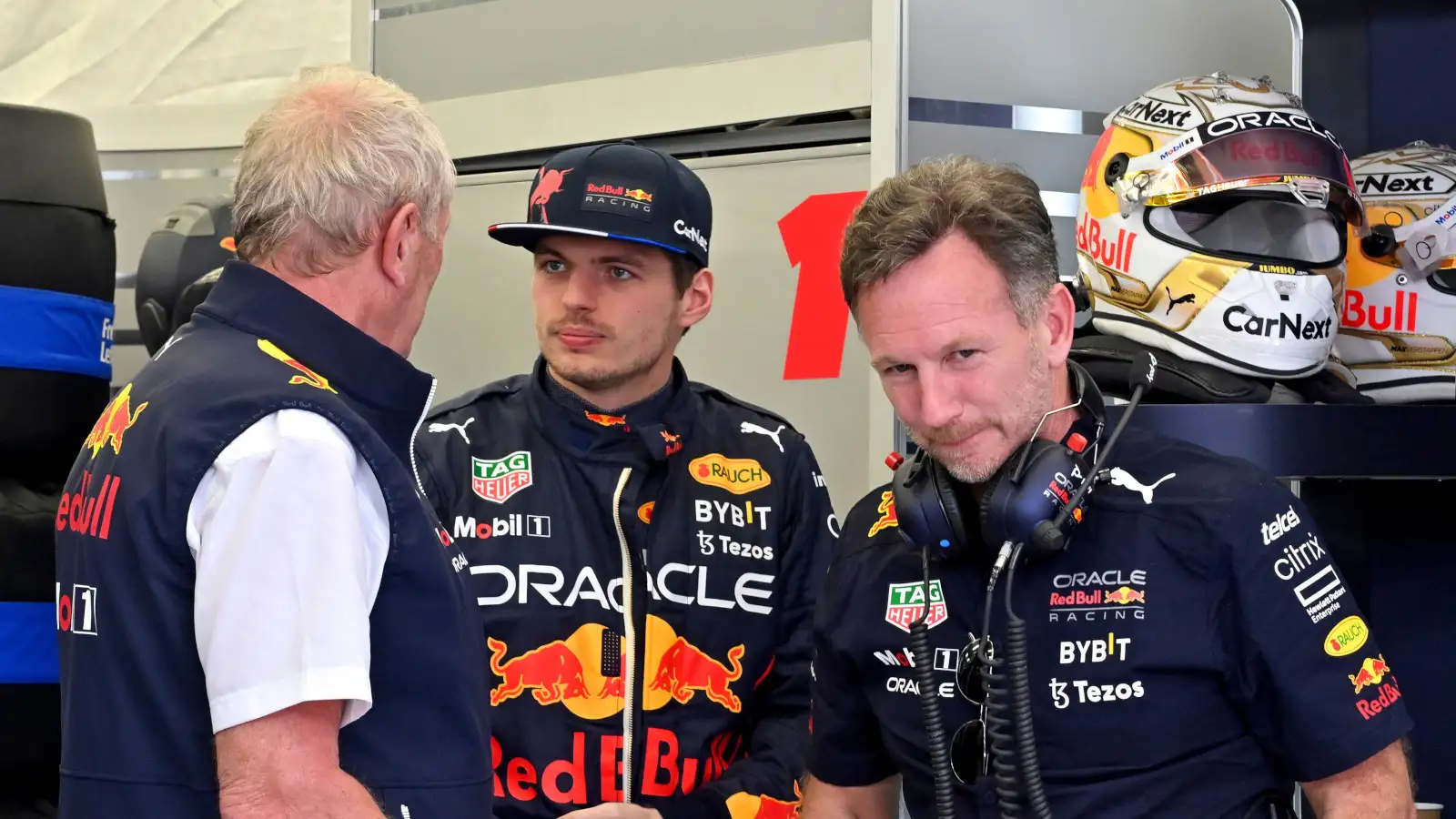 Max Verstappen speaking with Helmut Marko as Christian Horner walks away. Bahrain March 2022