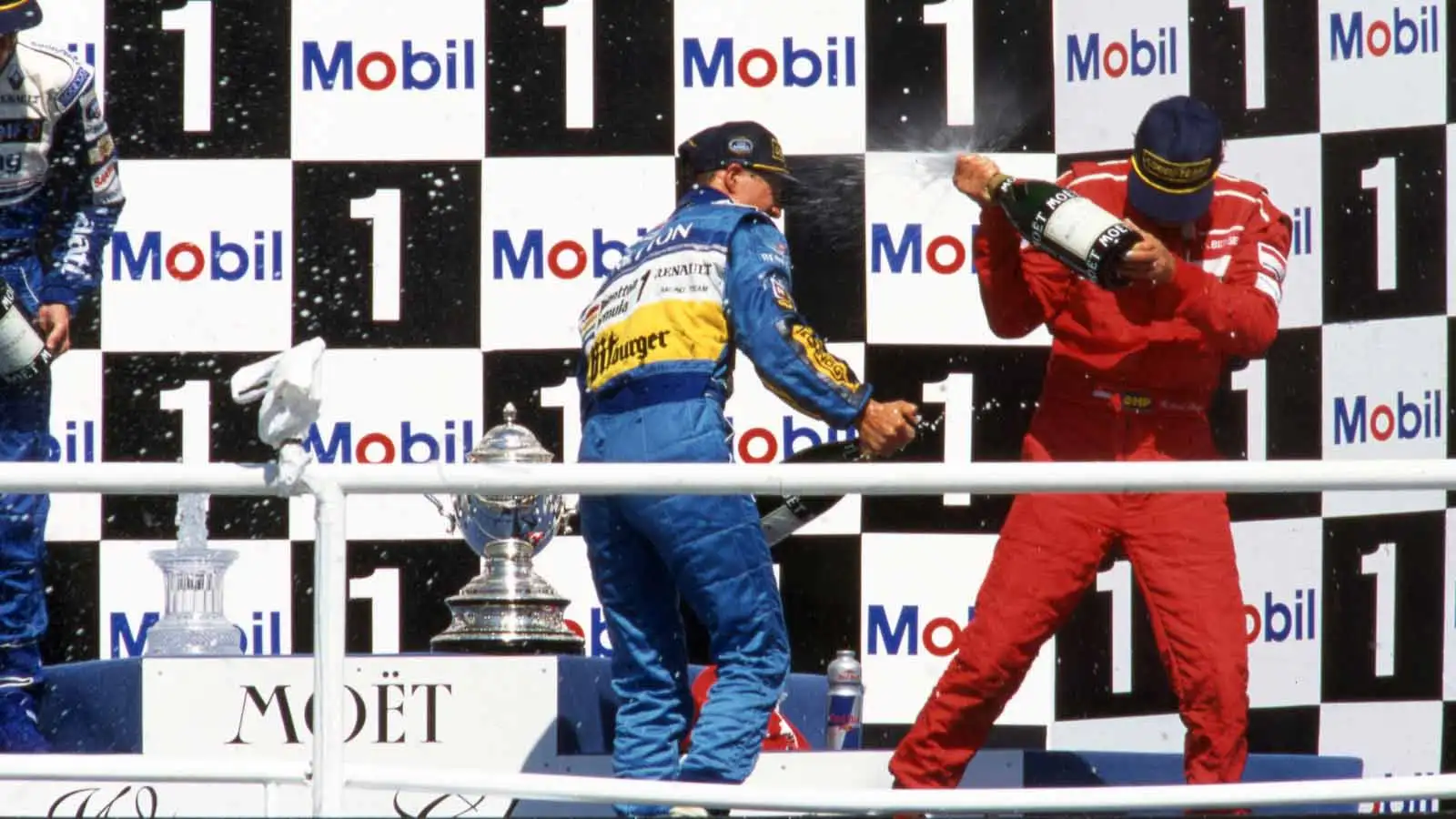 Michael Schumacher sprays champagne. 1995 German GP Hockenheim.