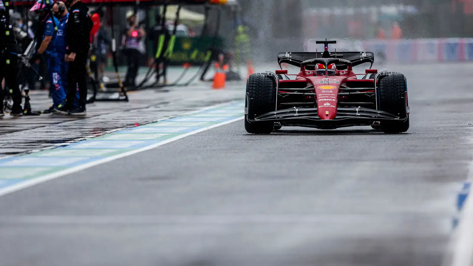 Charles Leclerc drives down a wet Imola pit lane. Italy April 2022