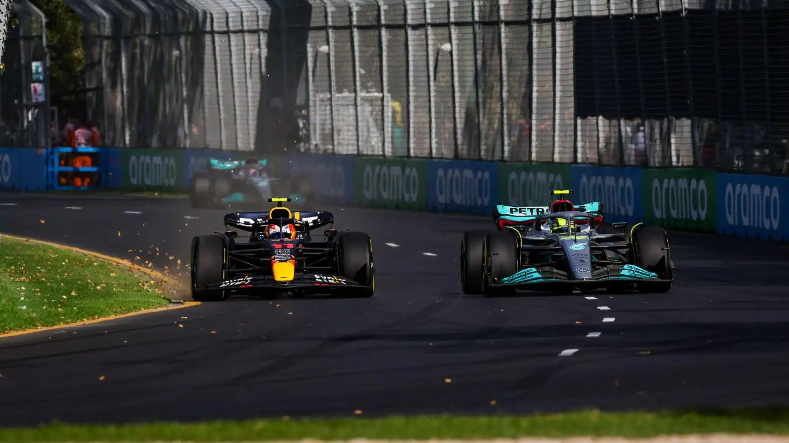 Sergio Perez alongside Lewis Hamilton in the Australian GP. Melbourne April 2022.