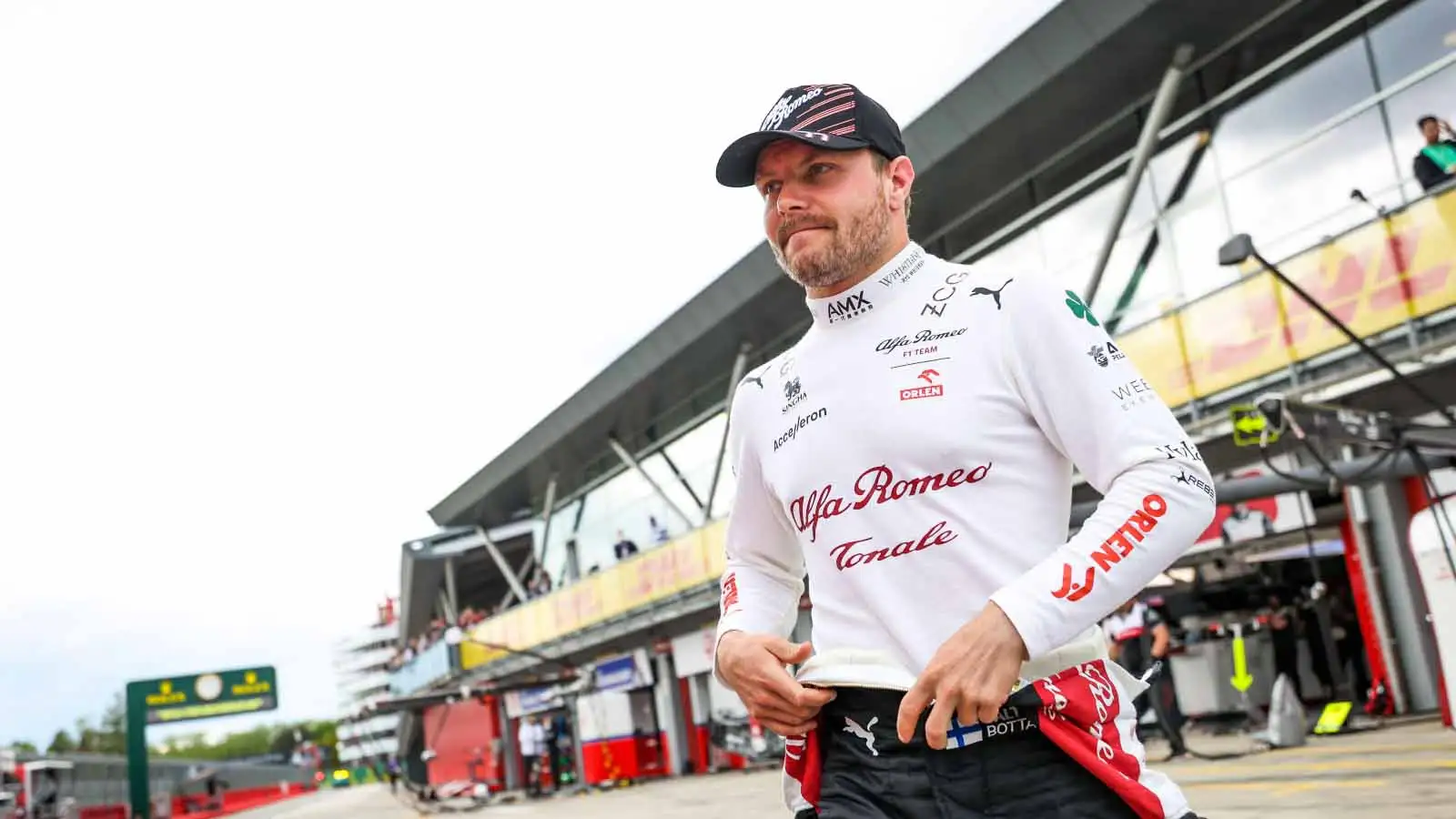 Valtteri Bottas walks through the pit lane. Imola April 2022.