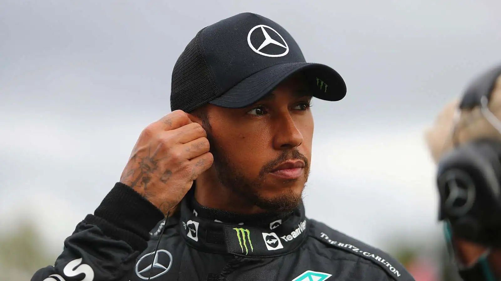 Lewis Hamilton puts in his earpiece. Imola April 2022.