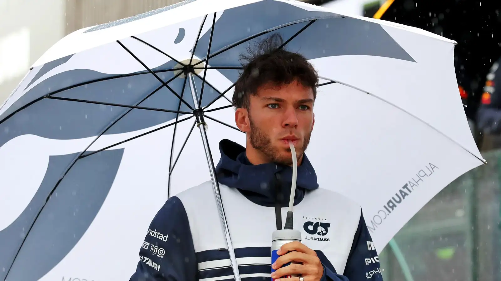Pierre Gasly, AlphaTauri, with a drink and umbrella. Italy, April 2022.